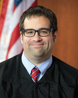 Tyler J. Buller