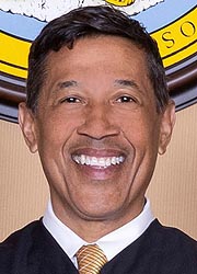 E. Gregory Wells