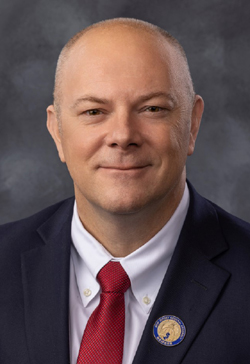 Gregory E. Myhre