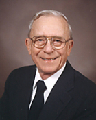 Curtis E. Brekke